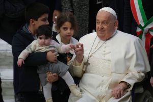 Pope John Francis, blessing children brought to him.